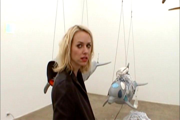 Ellie speaking to a friend